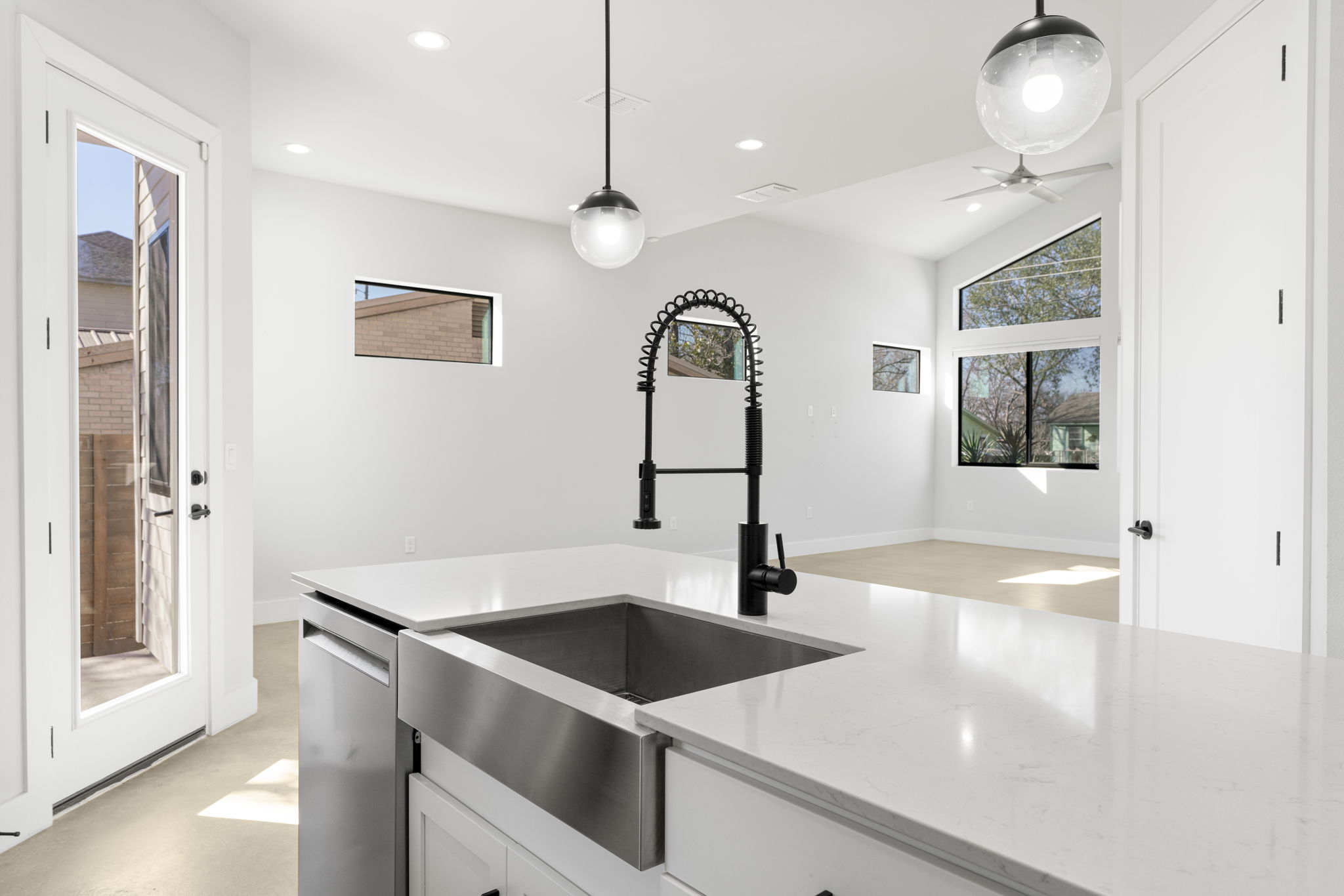 1405 Perez Street, Unit 1 Austin, TX 78721 - Photo 15 of 31 a kitchen with a sink a counter space and a refrigerator