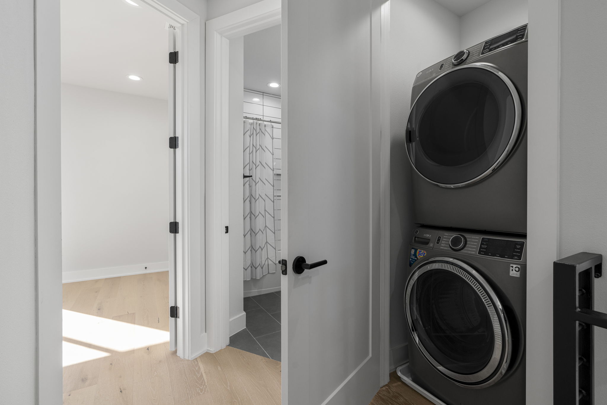 1405 Perez Street, Unit 1 Austin, TX 78721 - Photo 21 of 31 a view of a hallway with washer and dryer