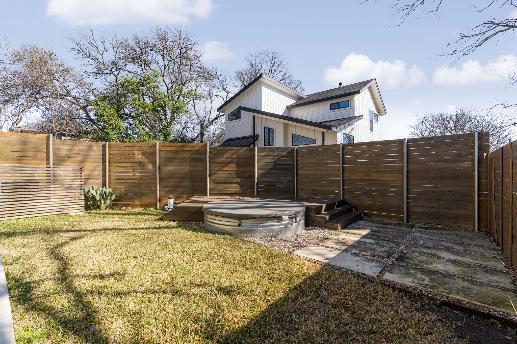 1405 Perez Street, Unit 1 Austin, TX 78721 - Photo 28 of 31 a view of house with backyard and seating area