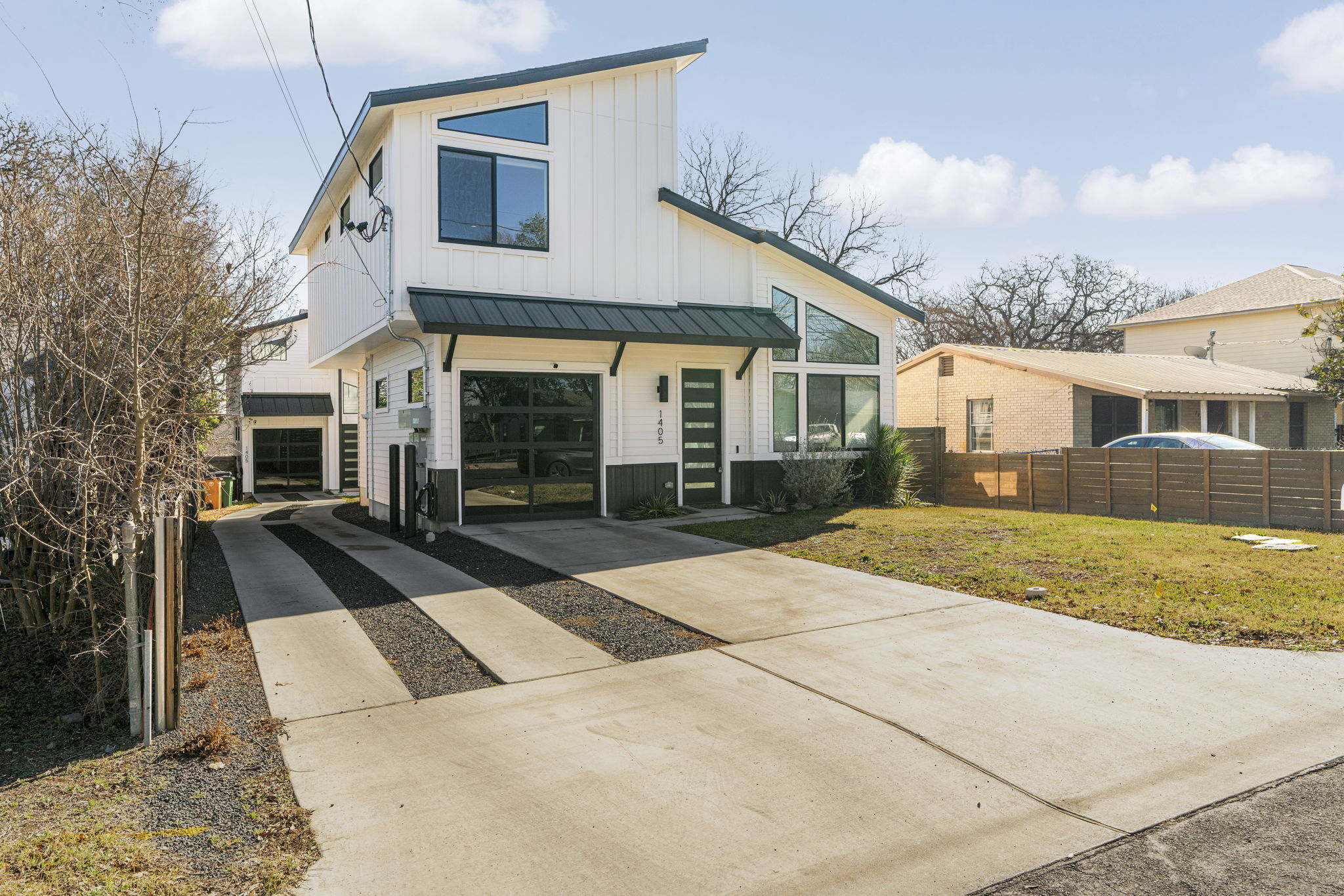 1405 Perez Street, Unit 1 Austin, TX 78721 - Photo 31 of 31 a front view of a house with glass windows