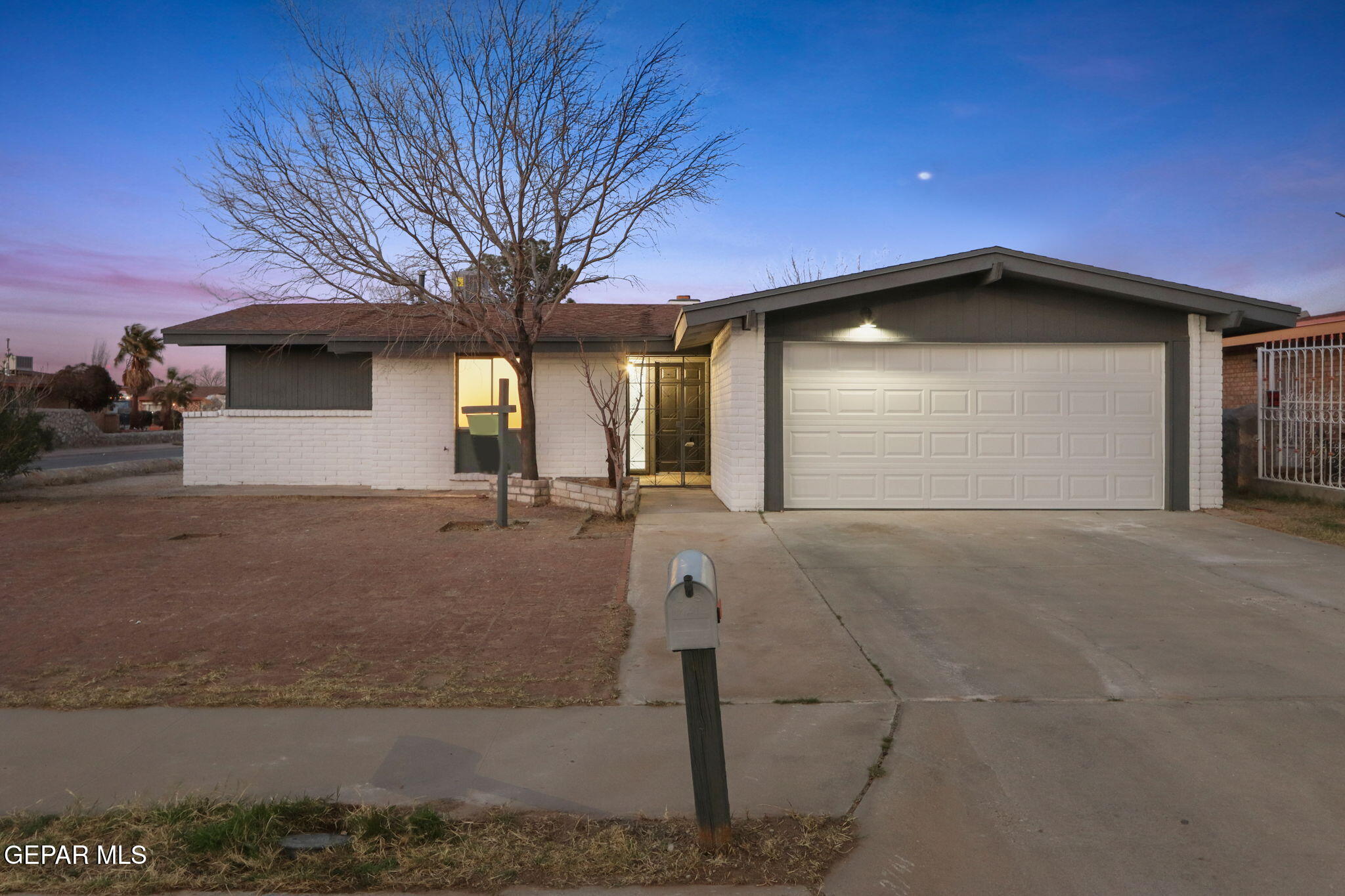 a view of a house with a garage