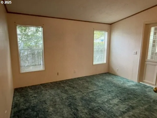 a bathroom with a granite countertop toilet and a shower