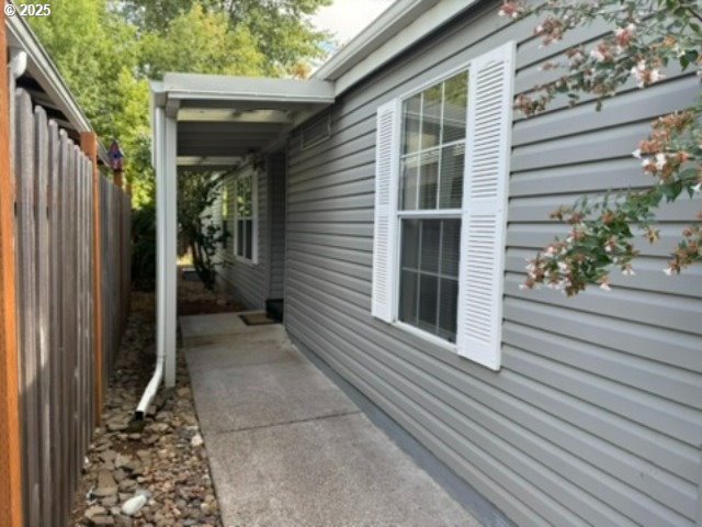 1401 West Ellendale Avenue, Unit 9 Dallas, OR 97338 - Photo 3 of 34 a view of a house with a backyard
