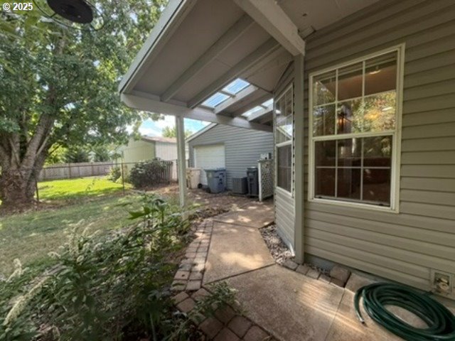 1401 West Ellendale Avenue, Unit 9 Dallas, OR 97338 - Photo 31 of 34 a front view of a house with garden