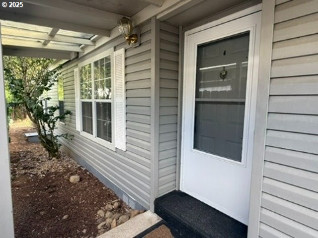 1401 West Ellendale Avenue, Unit 9 Dallas, OR 97338 - Photo 4 of 34 a view of a door of the house