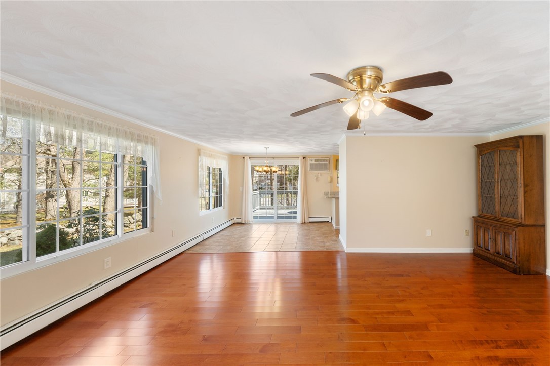 22 Eagle Run, Unit A Warwick, RI 02818 - Photo 12 of 34 Sunlight filled living/dining areas