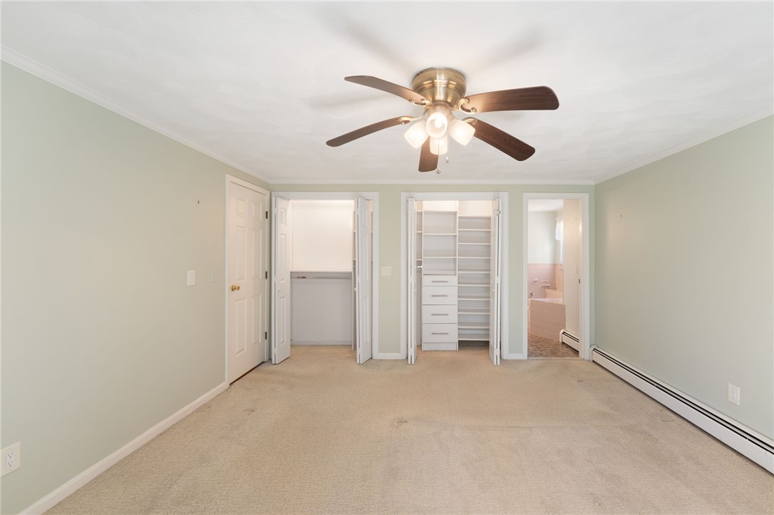 22 Eagle Run, Unit A Warwick, RI 02818 - Photo 19 of 34 Primary bedroom with great closet storage system