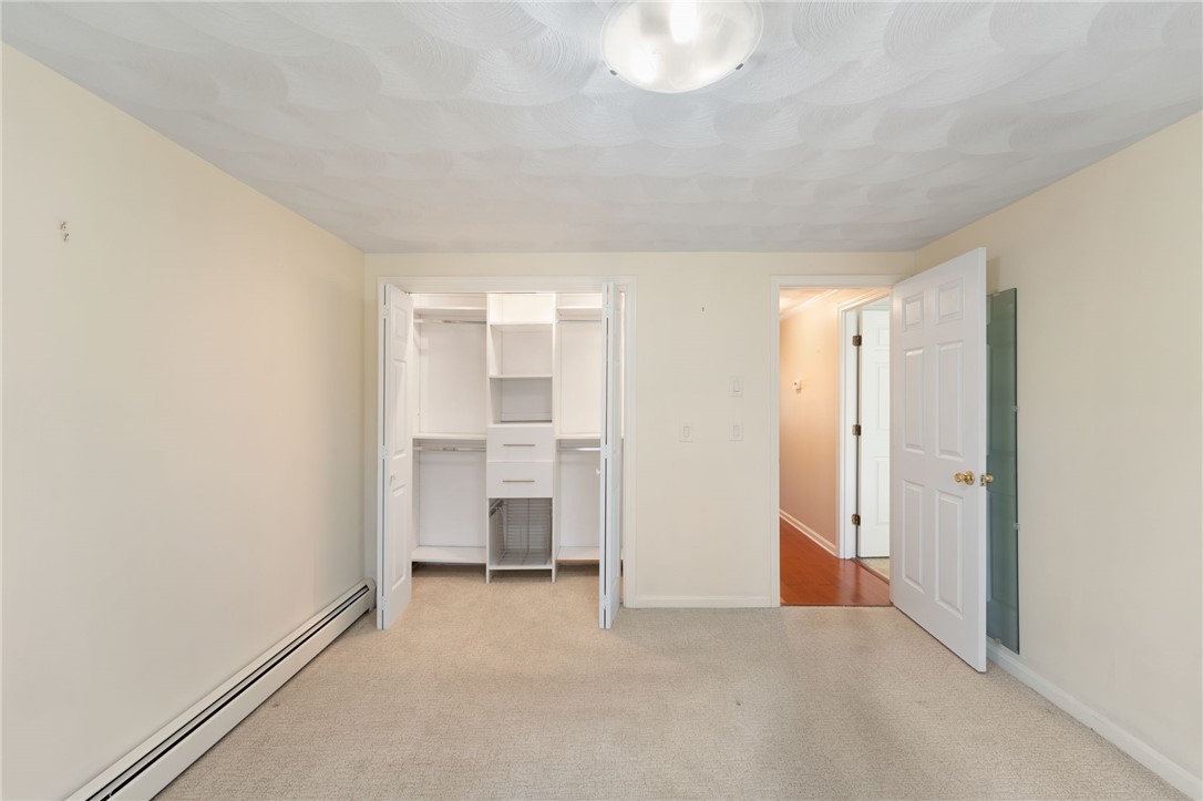 22 Eagle Run, Unit A Warwick, RI 02818 - Photo 22 of 34 Second bedroom with closet storage system