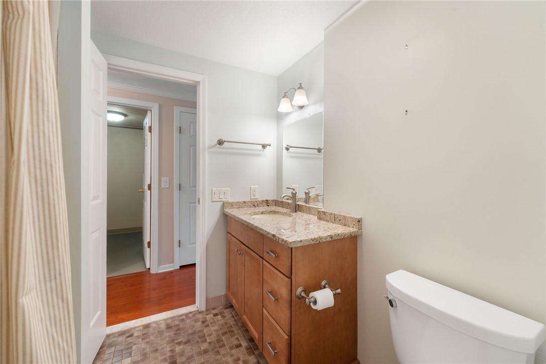 22 Eagle Run, Unit A Warwick, RI 02818 - Photo 25 of 34 First full bathroom with walk-in shower