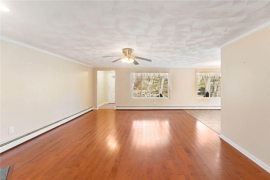 22 Eagle Run, Unit A Warwick, RI 02818 - Photo 10 of 34 Gorgeous cherry flooring in the living area