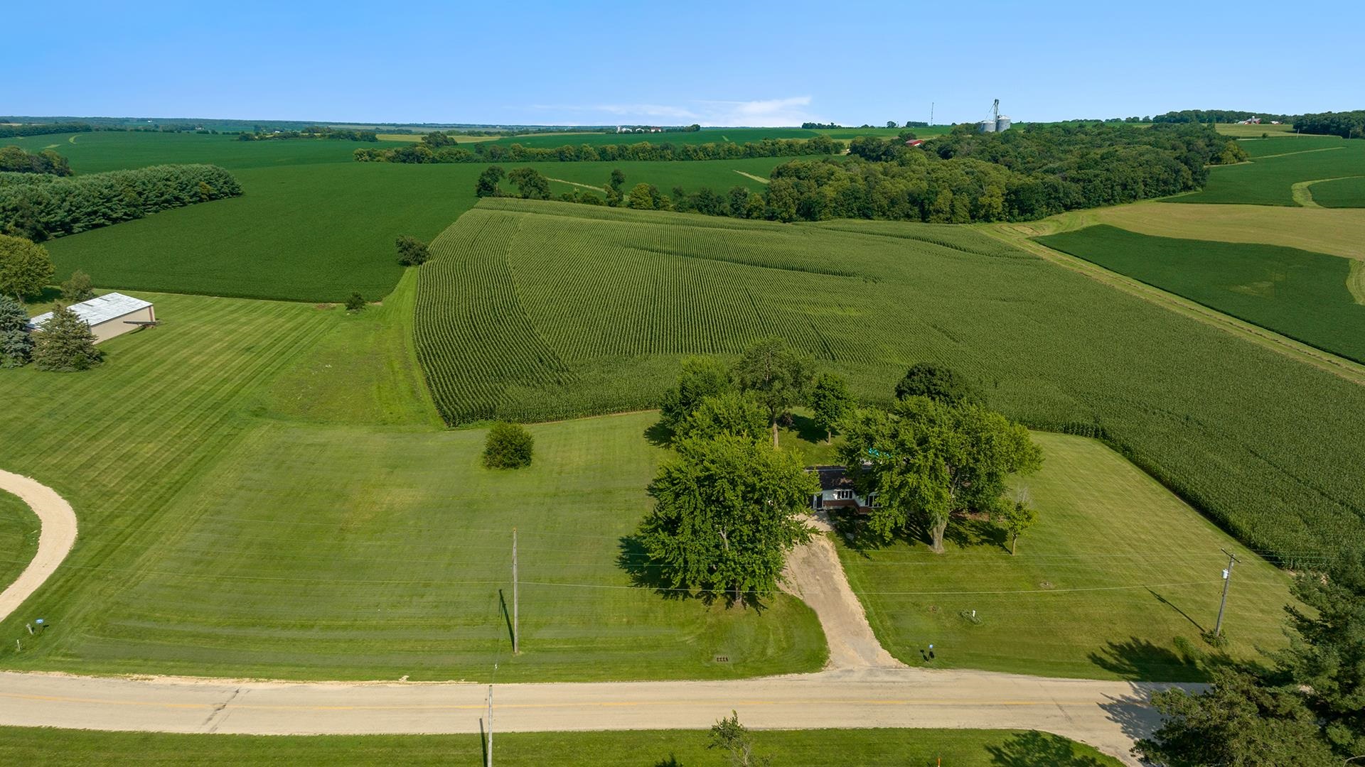 9807 North Leaf River Road Leaf River, IL 61047 - Photo 2 of 37 a view of a golf course with a garden