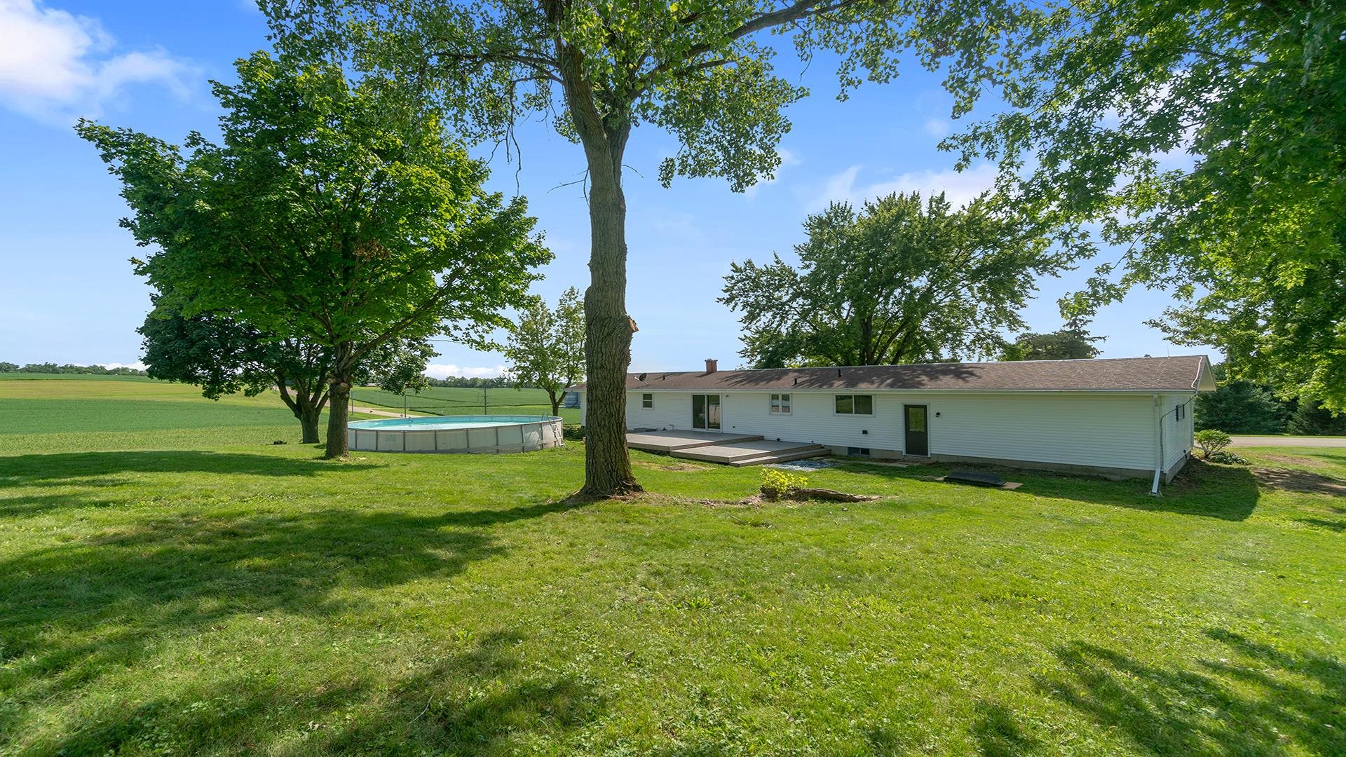 9807 North Leaf River Road Leaf River, IL 61047 - Photo 30 of 37 a view of a backyard with a small cabin