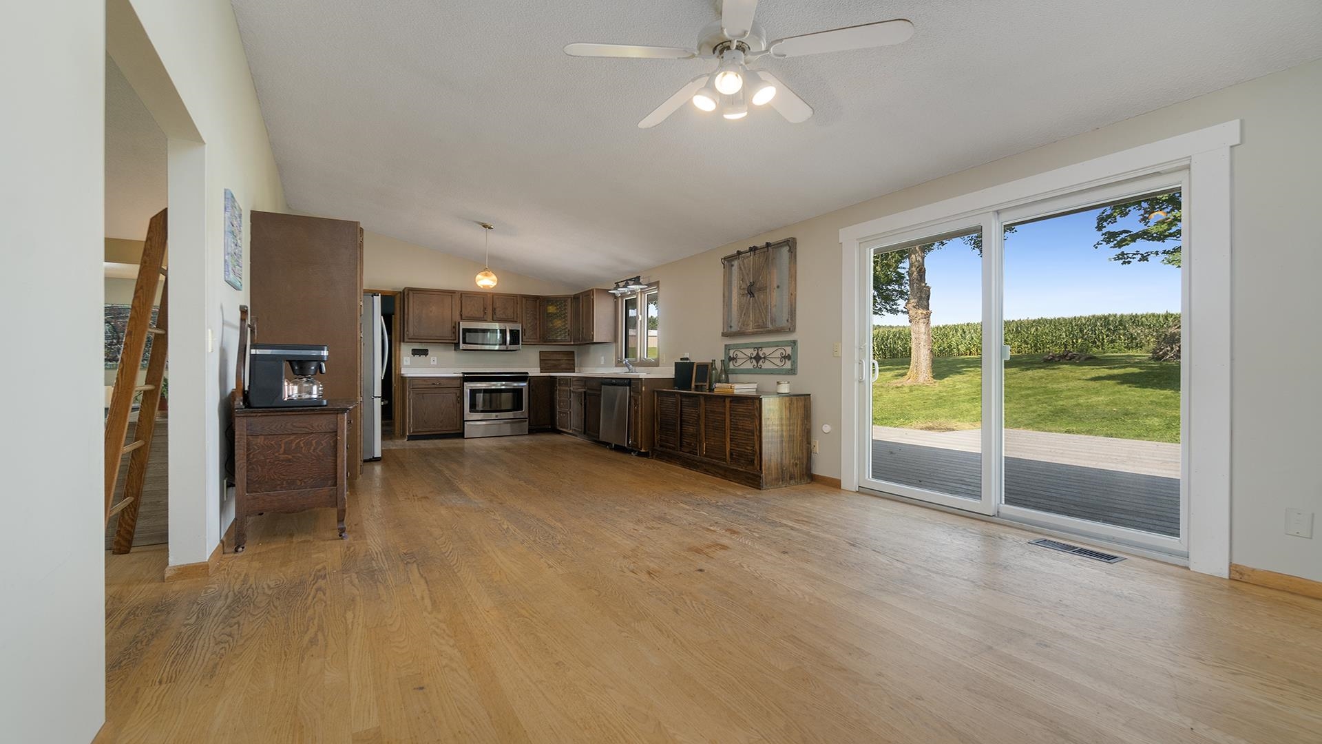 9807 North Leaf River Road Leaf River, IL 61047 - Photo 4 of 37 a view of kitchen with furniture and refrigerator