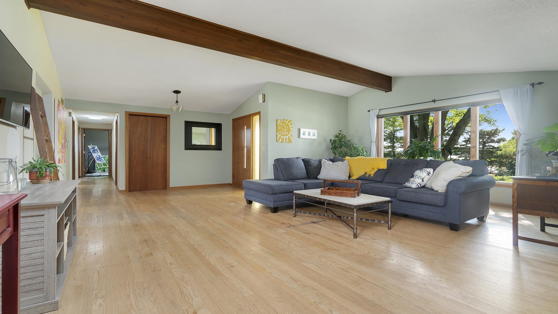 9807 North Leaf River Road Leaf River, IL 61047 - Photo 7 of 37 a living room with furniture and a large window