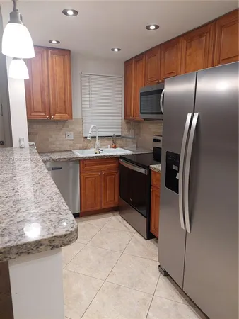 an empty room with a bathroom