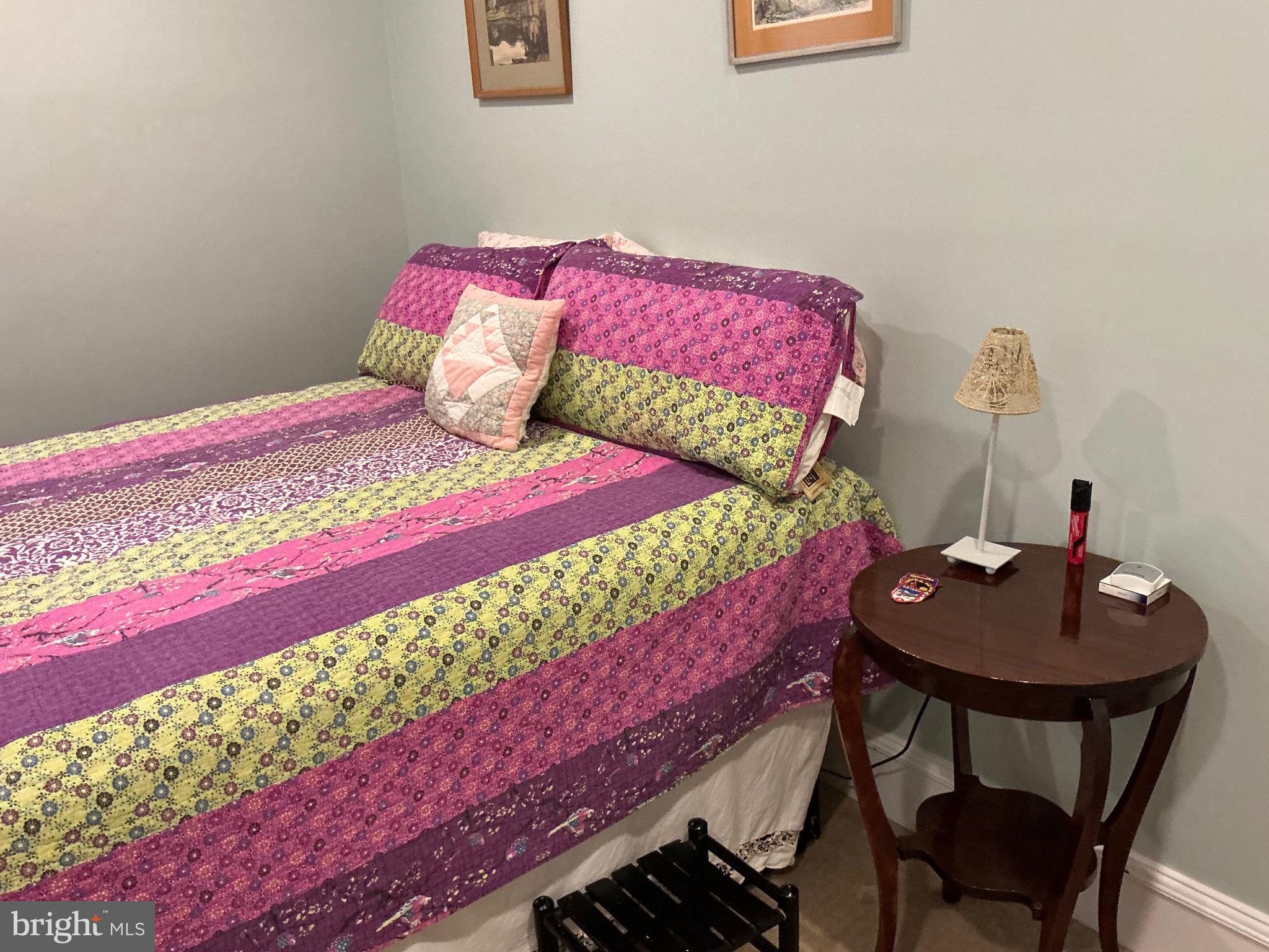 29 Centre Street Haddonfield, NJ 08033 - Photo 31 of 39 a bedroom with a bed and a table