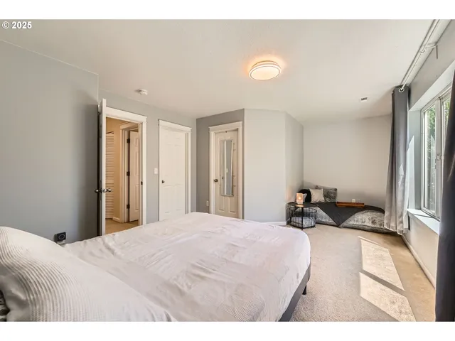 a kitchen with a sink and a mirror