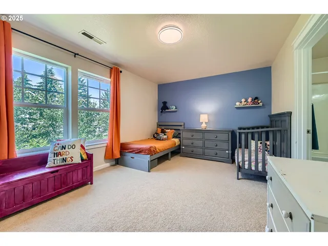a bathroom with a sink toilet a mirror and shower