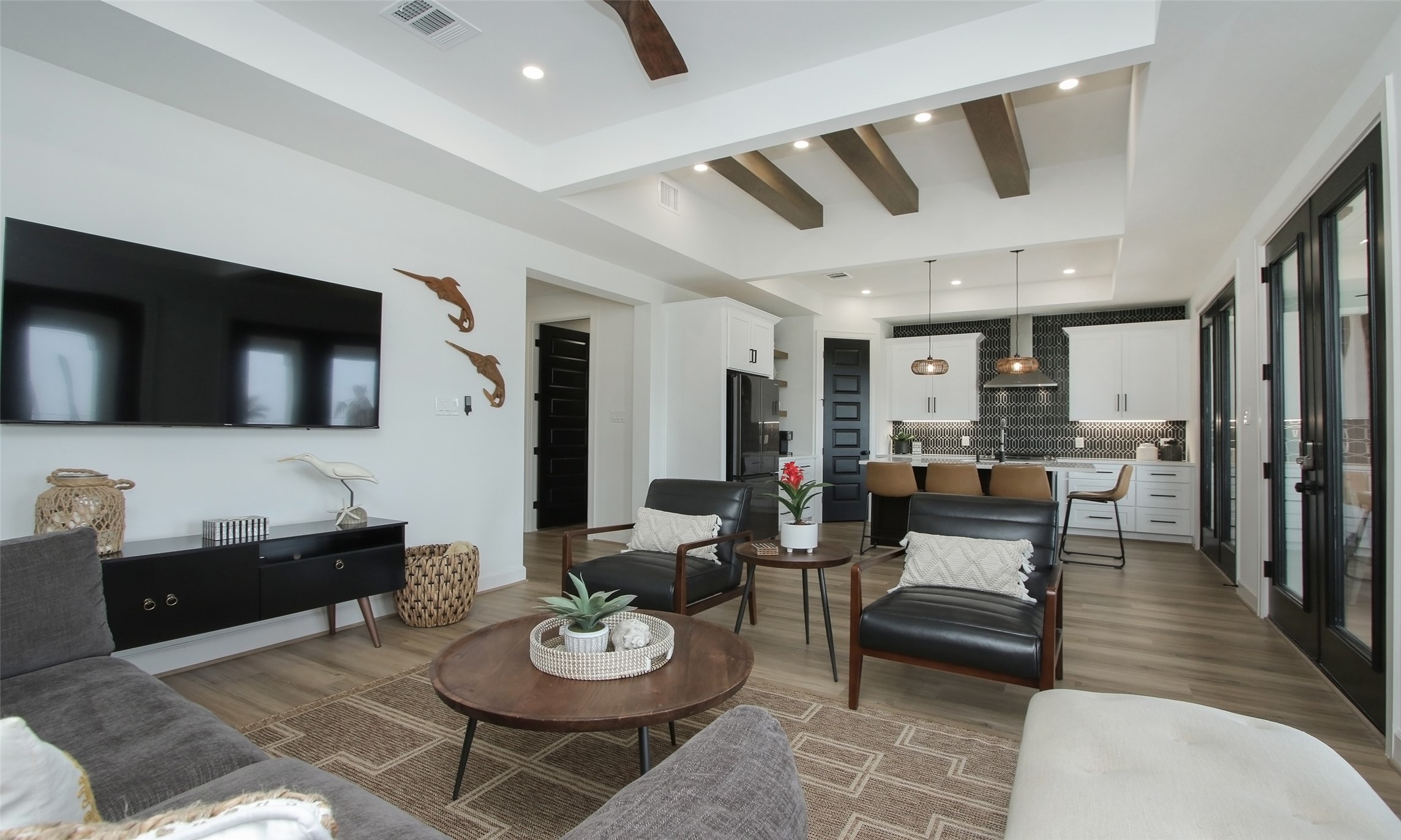 1817 Todville Road Seabrook, TX 77586 - Photo 11 of 27 a living room with furniture and a wooden floor