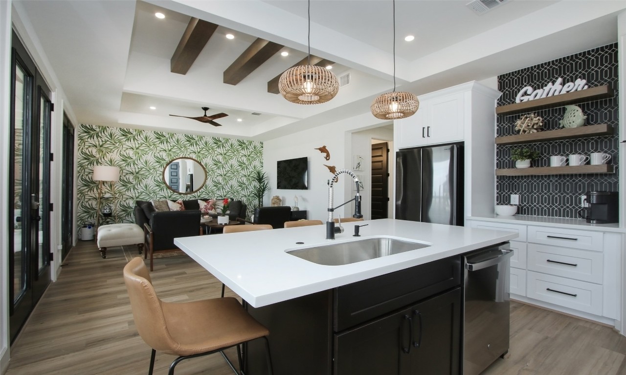 1817 Todville Road Seabrook, TX 77586 - Photo 14 of 27 a kitchen with a table chairs and a chandelier