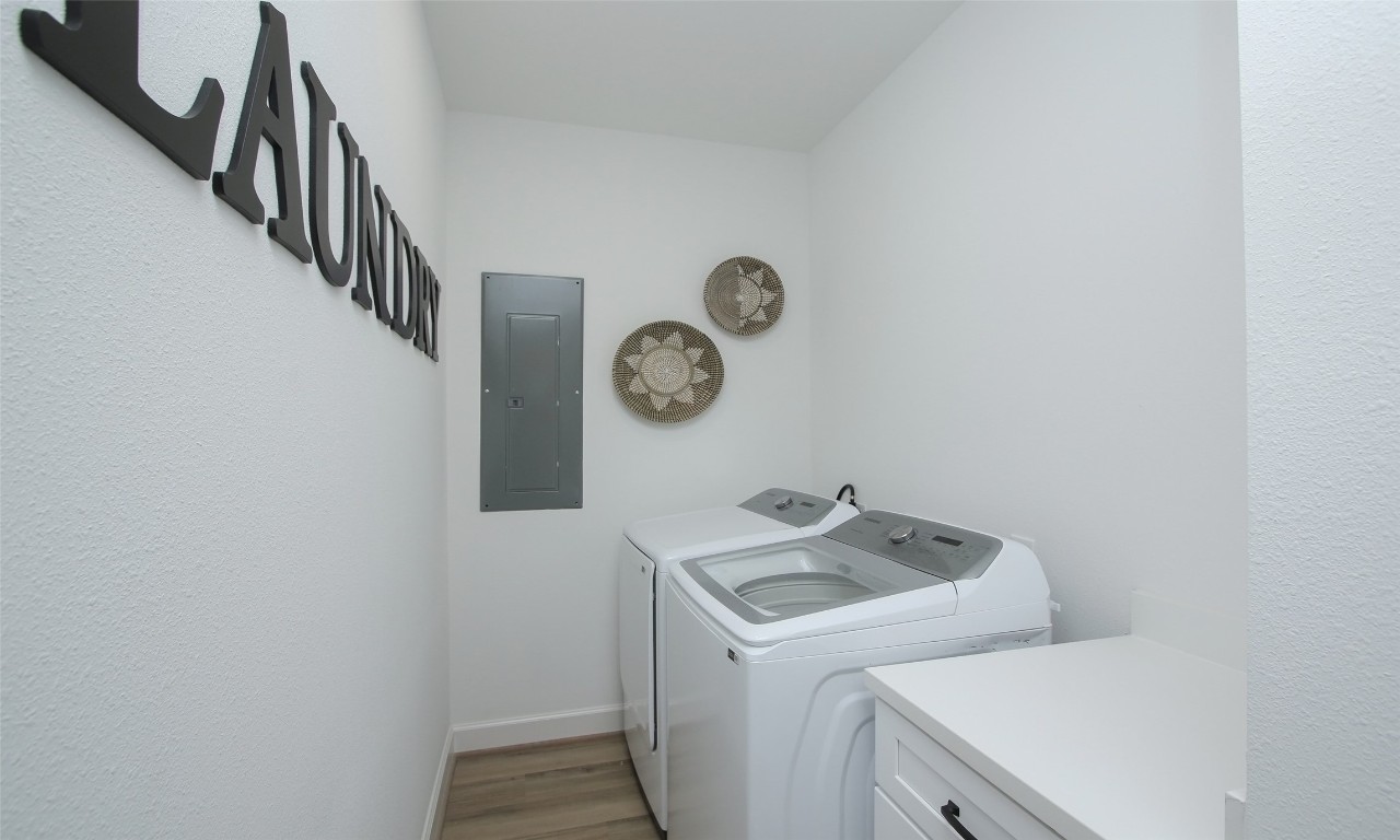 1817 Todville Road Seabrook, TX 77586 - Photo 21 of 27 a utility room with dryer and washer