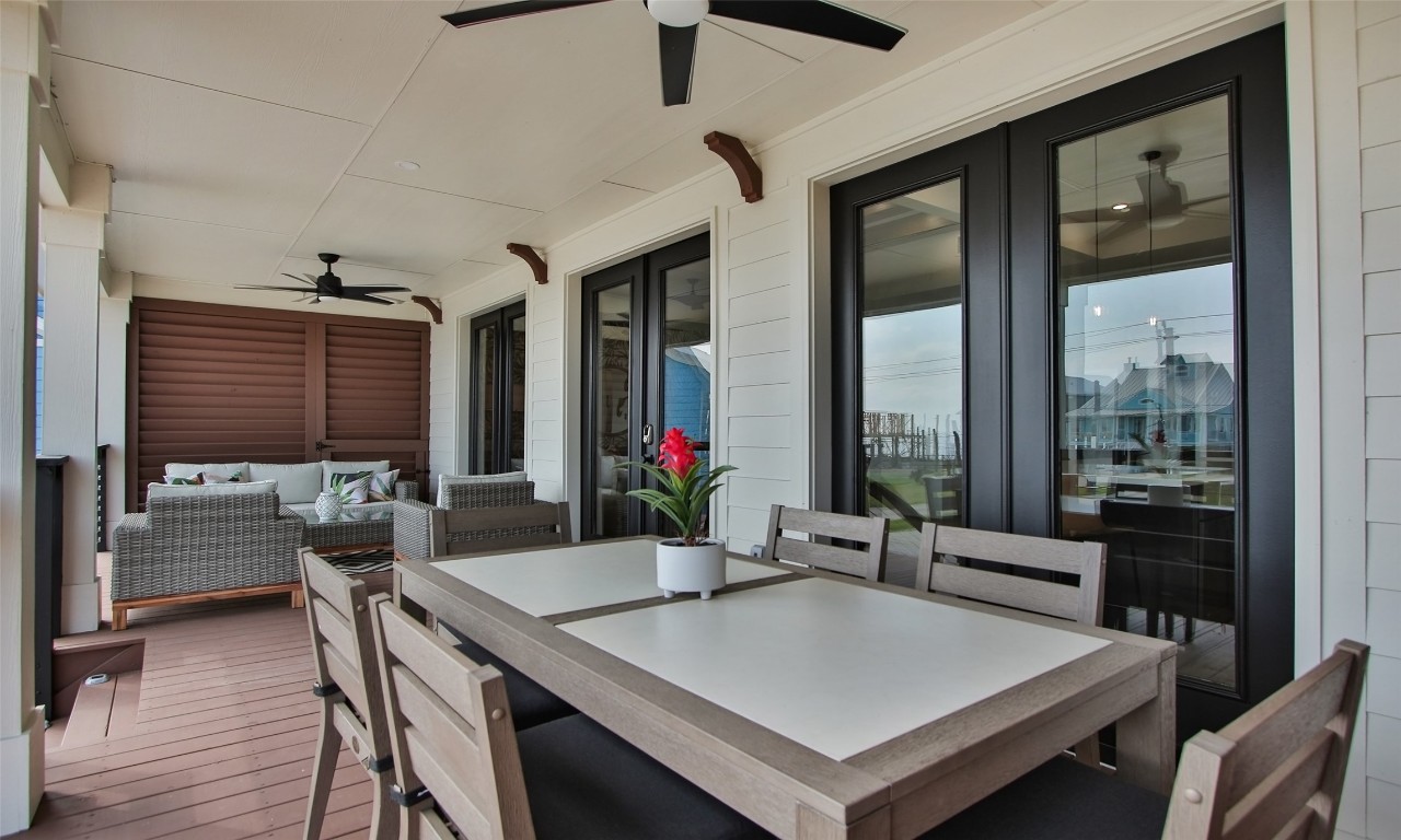 1817 Todville Road Seabrook, TX 77586 - Photo 22 of 27 a view of a dining room with furniture window and wooden floor