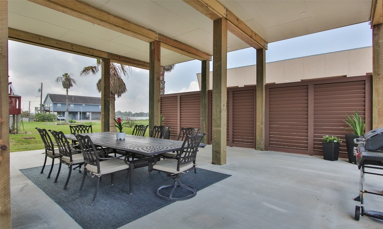 1817 Todville Road Seabrook, TX 77586 - Photo 24 of 27 a view of an outdoor dining space with furniture