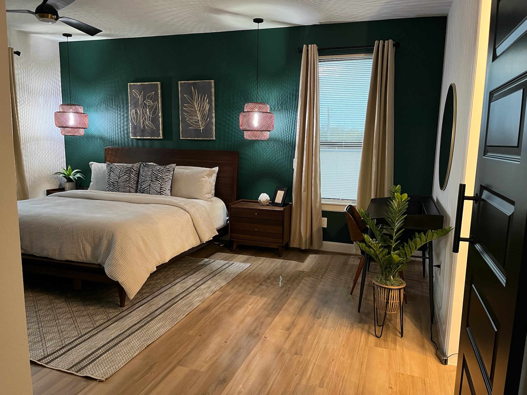 1817 Todville Road Seabrook, TX 77586 - Photo 3 of 27 a bedroom with a bed and a mirror