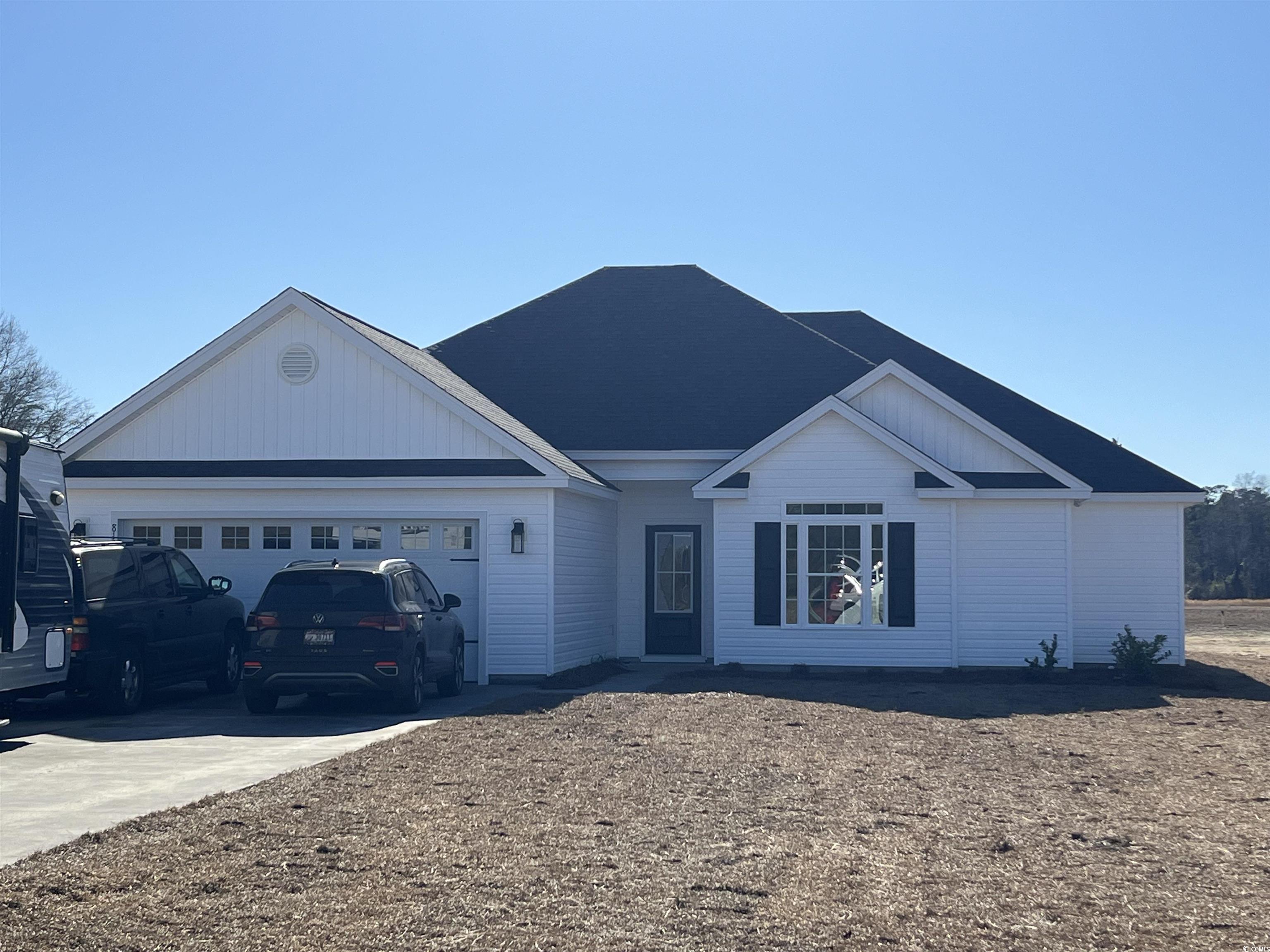 8193 Kerl Road Aynor, SC 29511 - Photo 1 of 11 Single story home featuring a garage