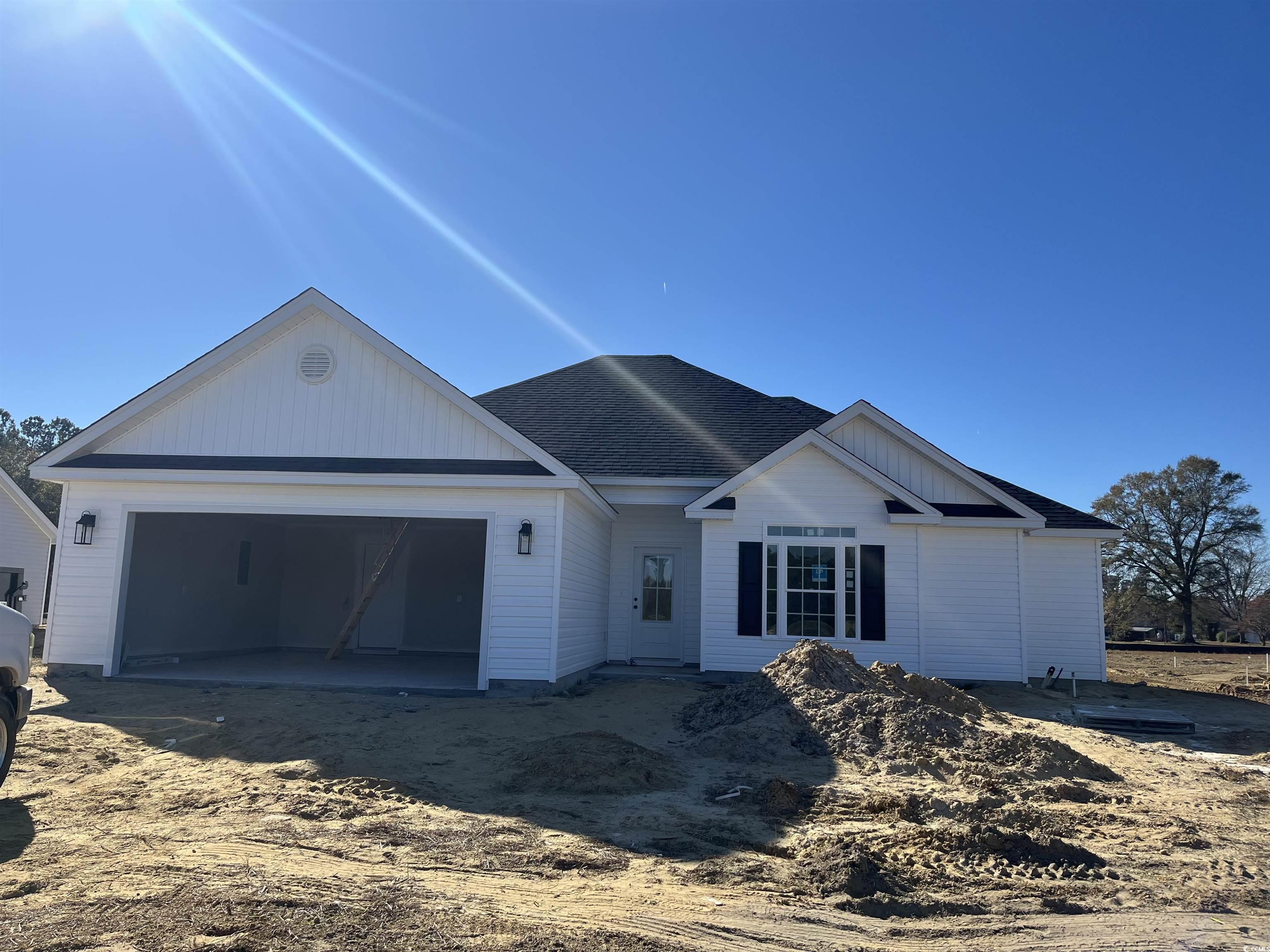 8193 Kerl Road Aynor, SC 29511 - Photo 2 of 11 View of front of property featuring a garage