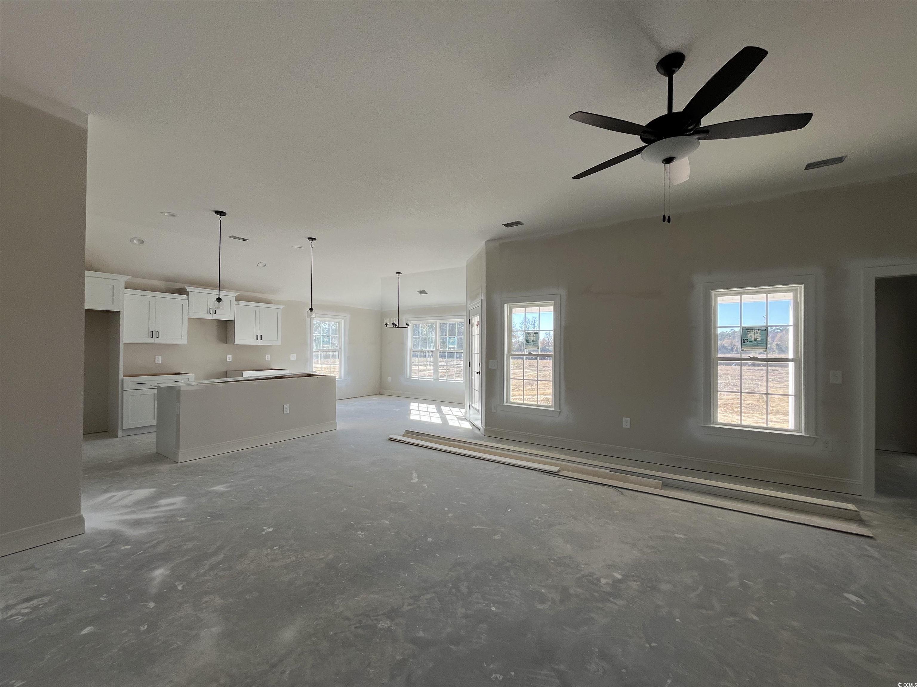 8193 Kerl Road Aynor, SC 29511 - Photo 4 of 11 Unfurnished living room featuring ceiling fan and
