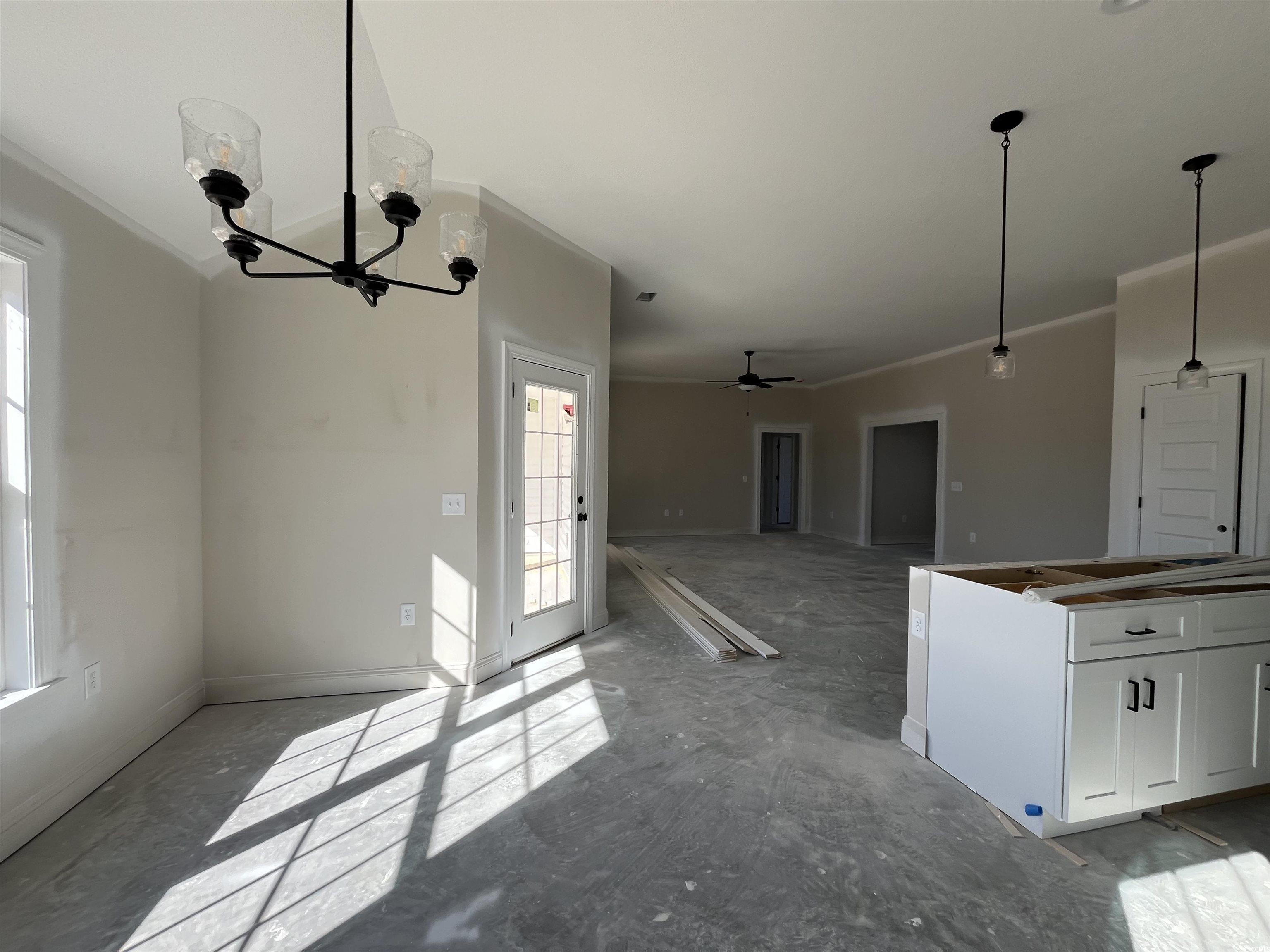 8193 Kerl Road Aynor, SC 29511 - Photo 5 of 11 Interior space with white cabinets, pendant lighti