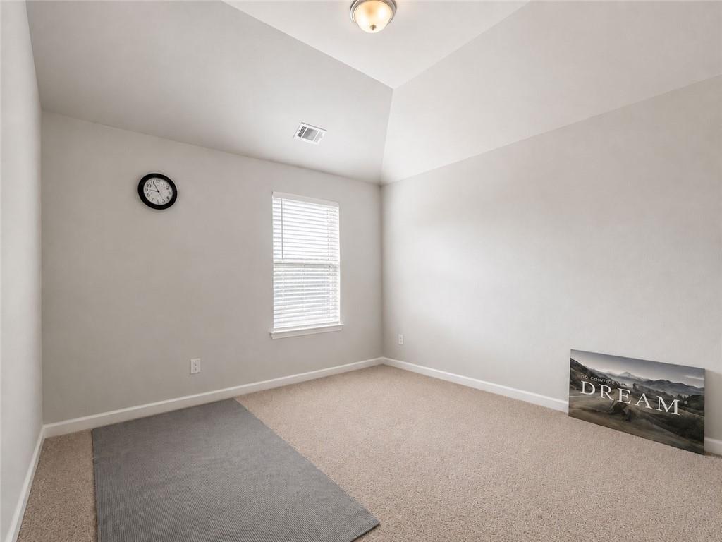 3359 Elkhorn Ridge Run Dacula, GA 30019 - Photo 20 of 35 an empty room with windows