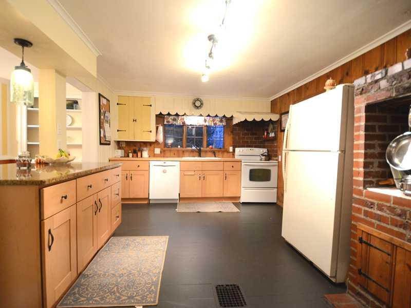 5926 Heckert Road Bakerstown, PA 15007 - Photo 5 of 24 Kitchen. Huge kitchen with wood floor with new cabinets, butcher block counters, granite breakfast counter, newer appliances
