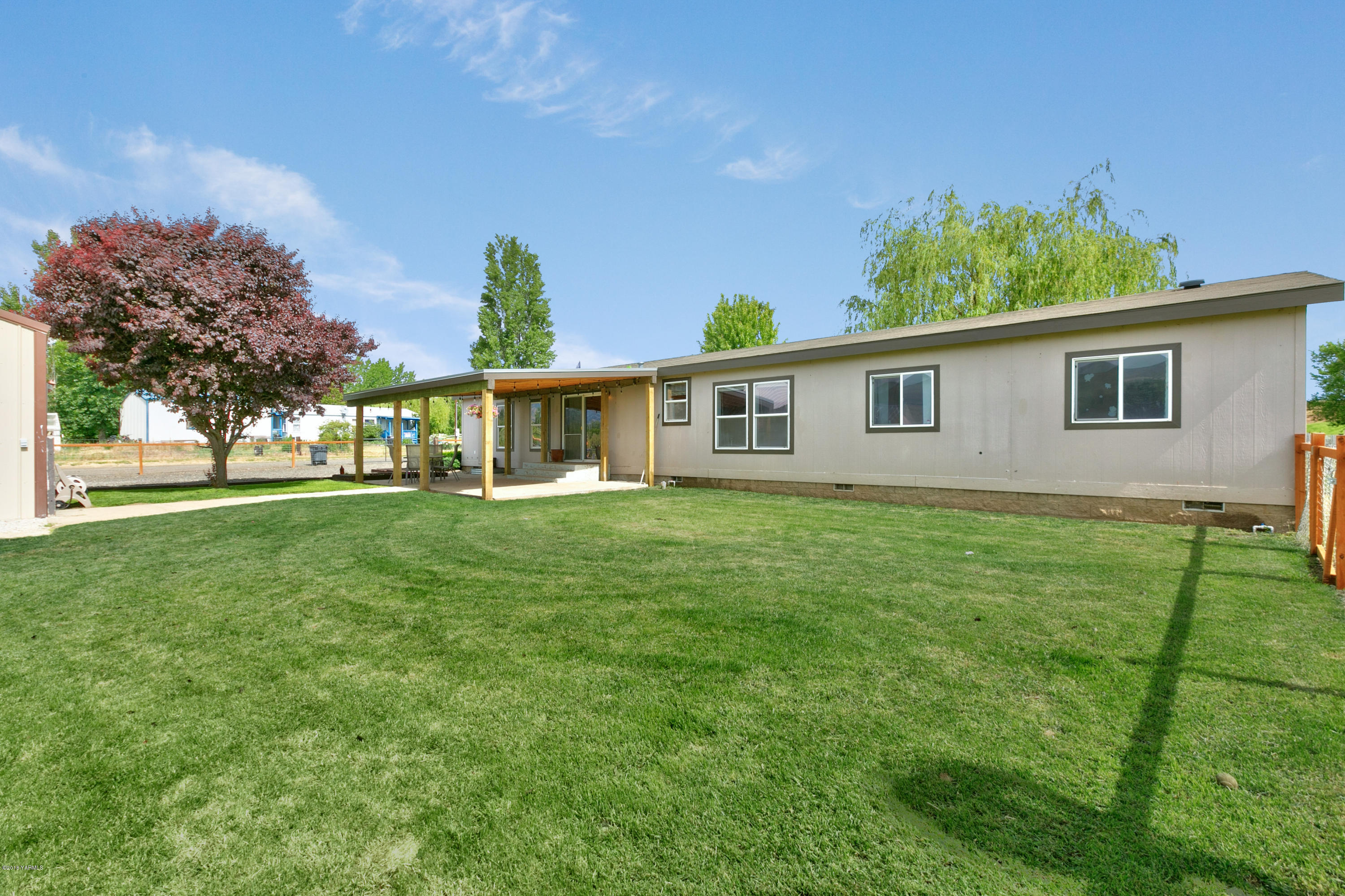 22490 Ahtanum Road Yakima, WA 98903 - Photo 16 of 20 a front view of house with yard and green space