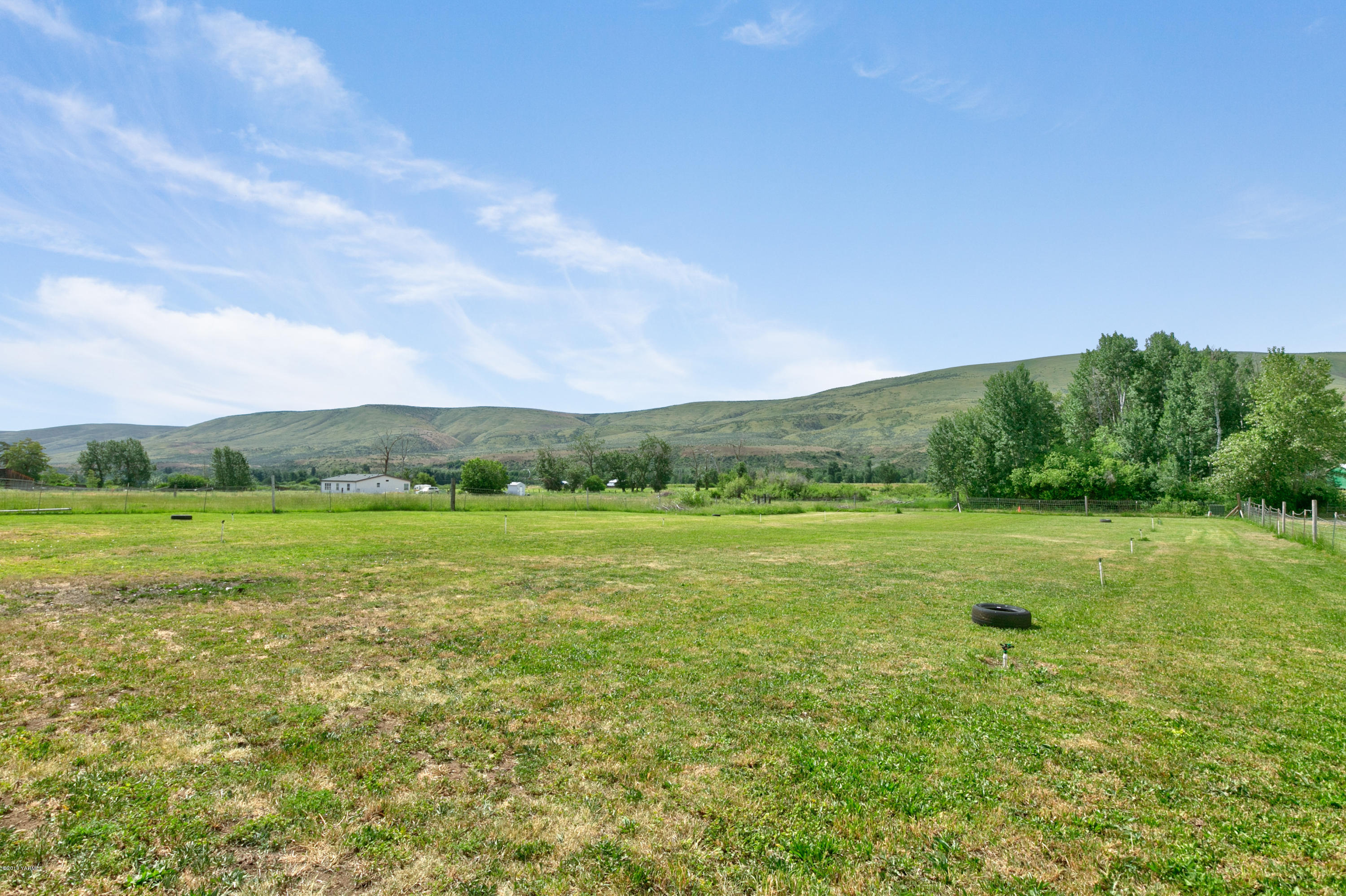 22490 Ahtanum Road Yakima, WA 98903 - Photo 18 of 20 a view of an outdoor space and a yard