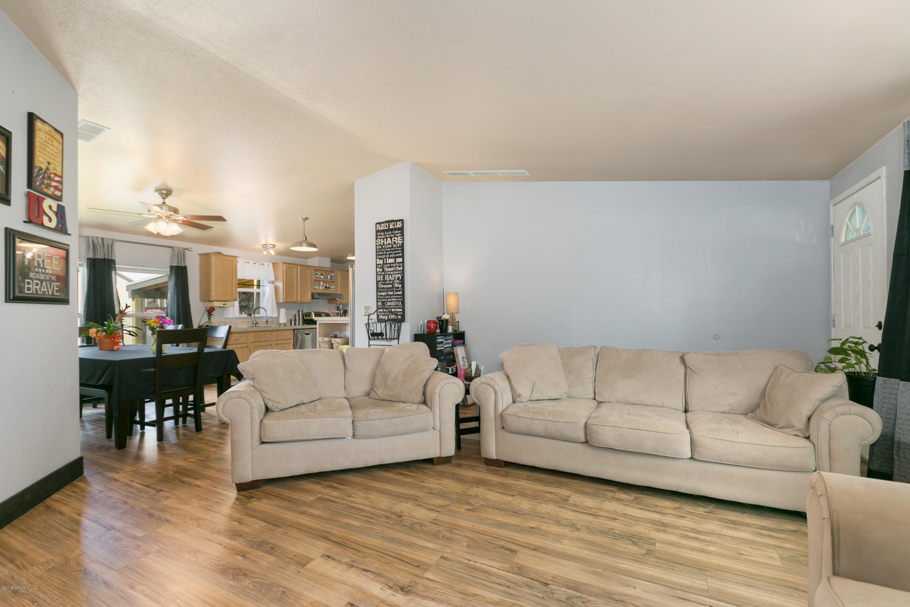 22490 Ahtanum Road Yakima, WA 98903 - Photo 3 of 20 a living room with furniture and a large window