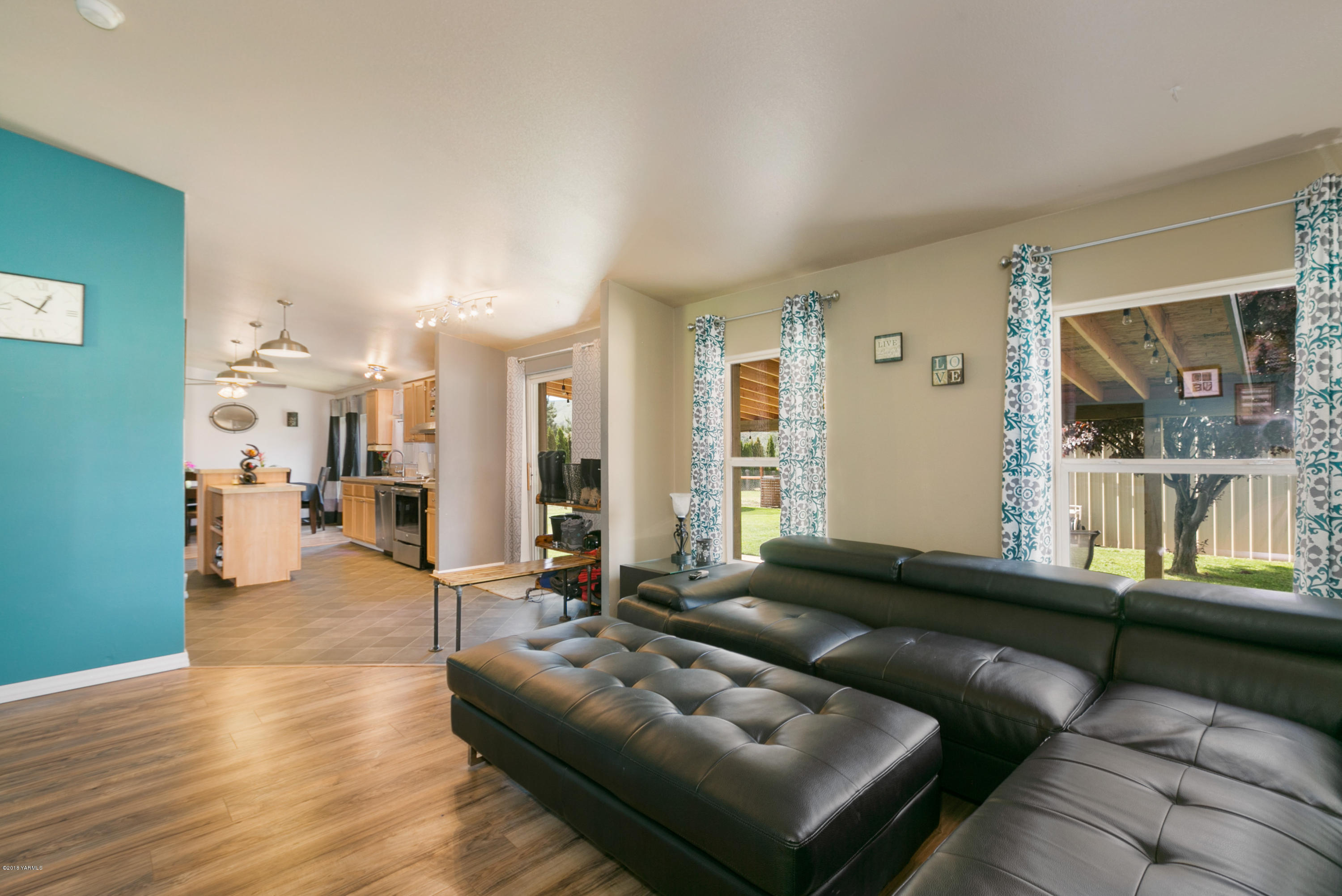 22490 Ahtanum Road Yakima, WA 98903 - Photo 8 of 20 a living room with furniture and a large window