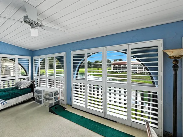 a view of a porch with furniture