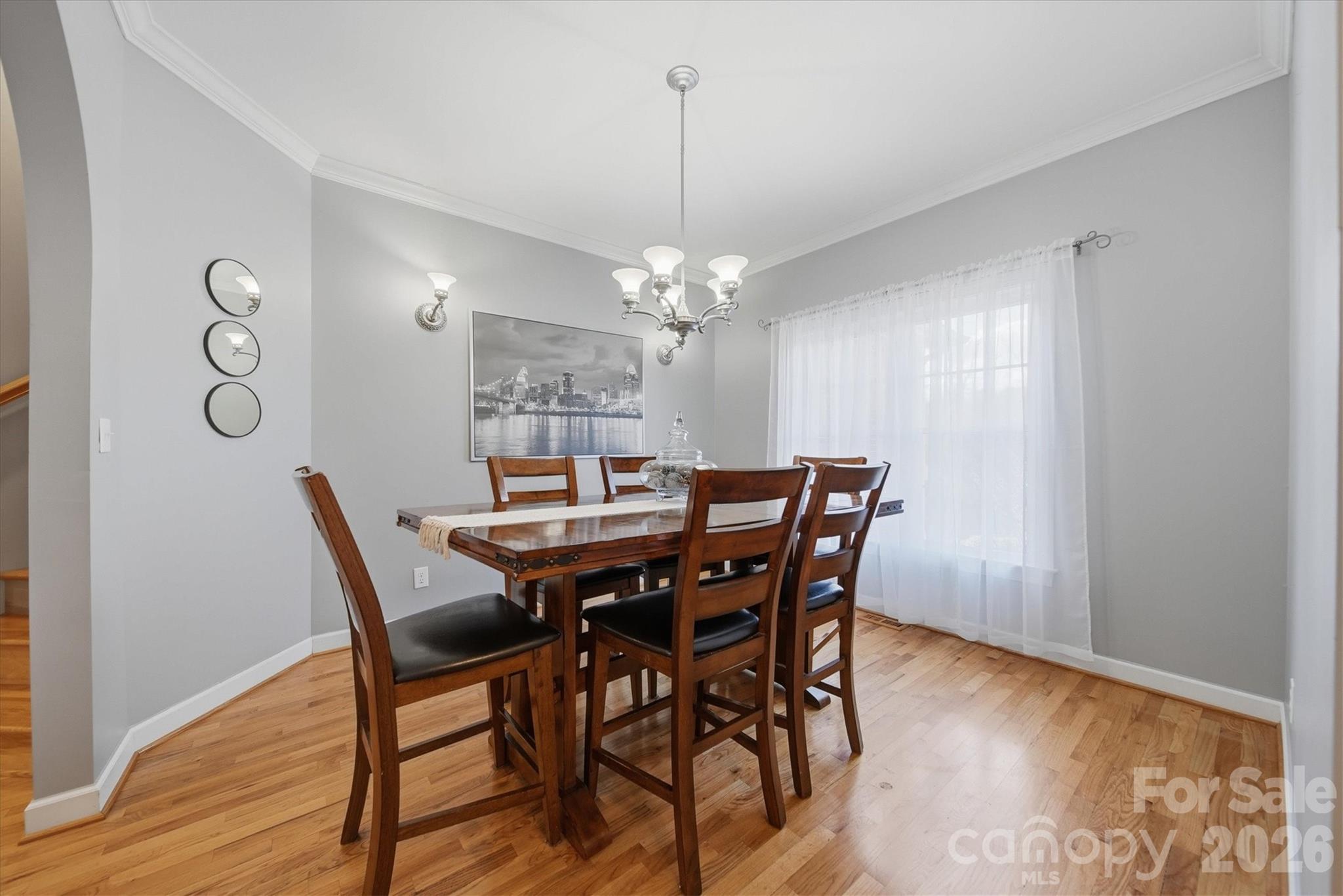 2555 Knox Landing Road Connelly Springs, NC 28612 - Photo 11 of 48 a view of a dining room with furniture and wooden floor