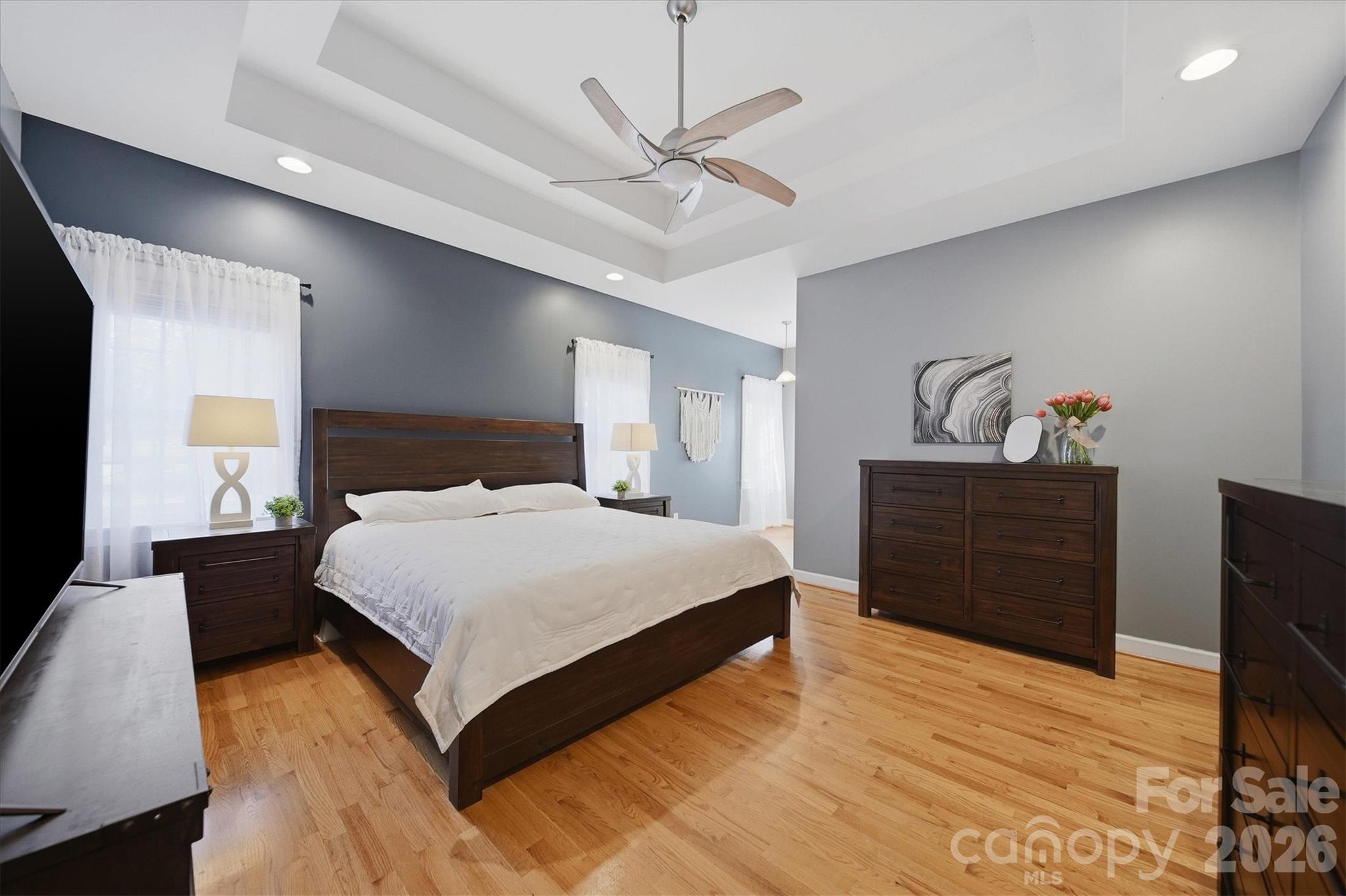 2555 Knox Landing Road Connelly Springs, NC 28612 - Photo 17 of 48 a bedroom with a bed and wooden floor