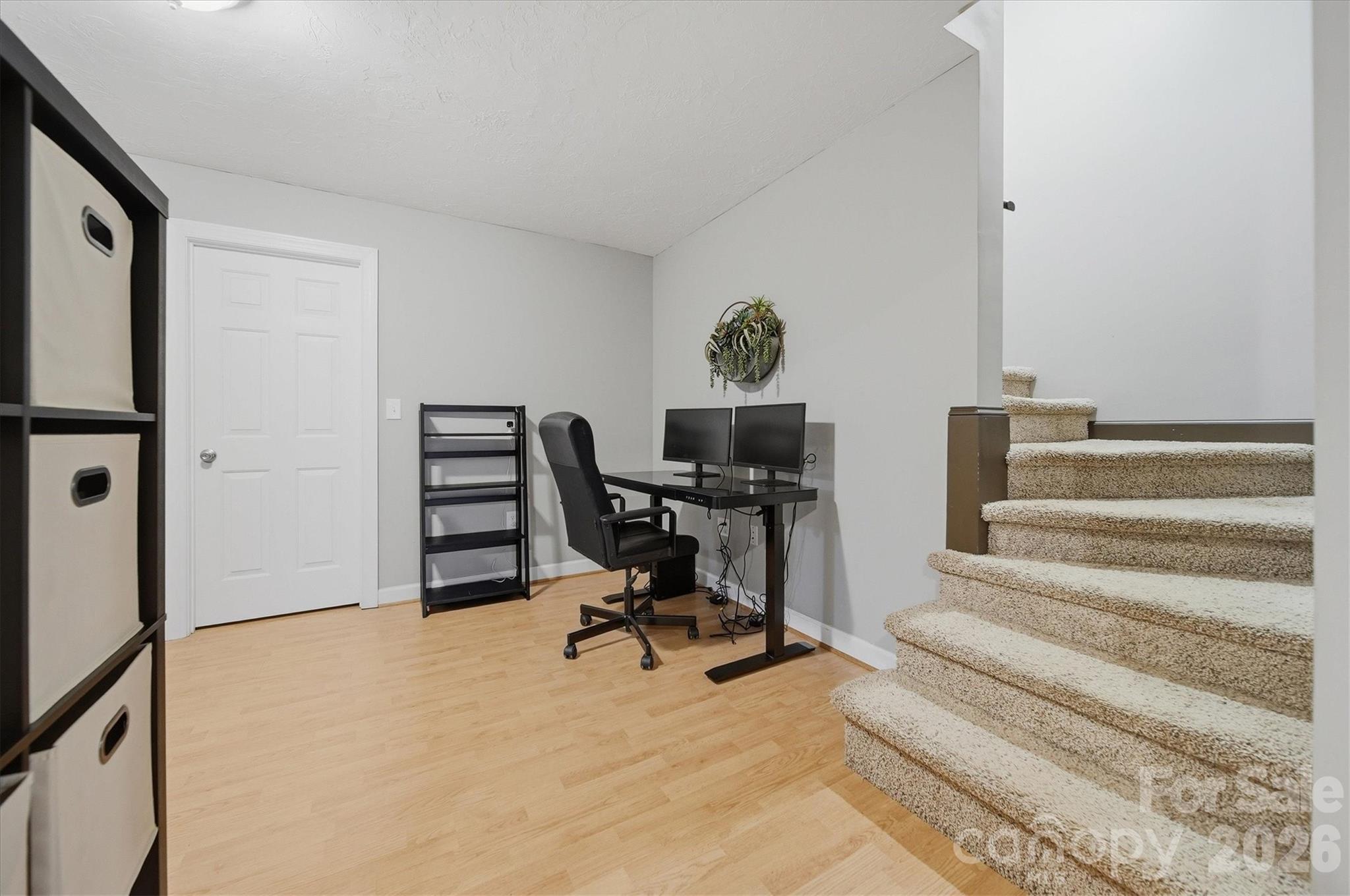 2555 Knox Landing Road Connelly Springs, NC 28612 - Photo 32 of 48 a view of a workspace with furniture and a window