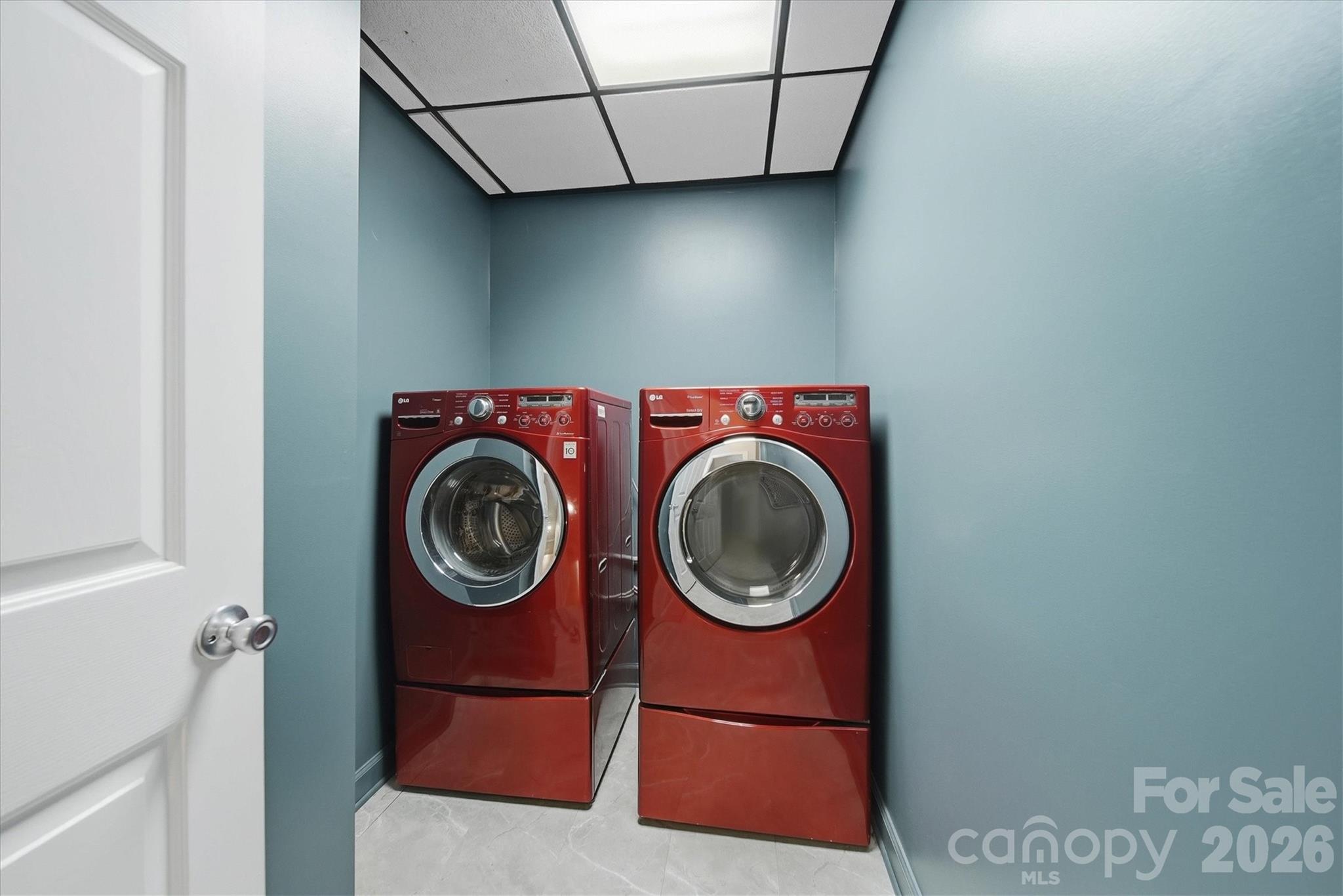 2555 Knox Landing Road Connelly Springs, NC 28612 - Photo 34 of 48 a utility room with dryer and washer