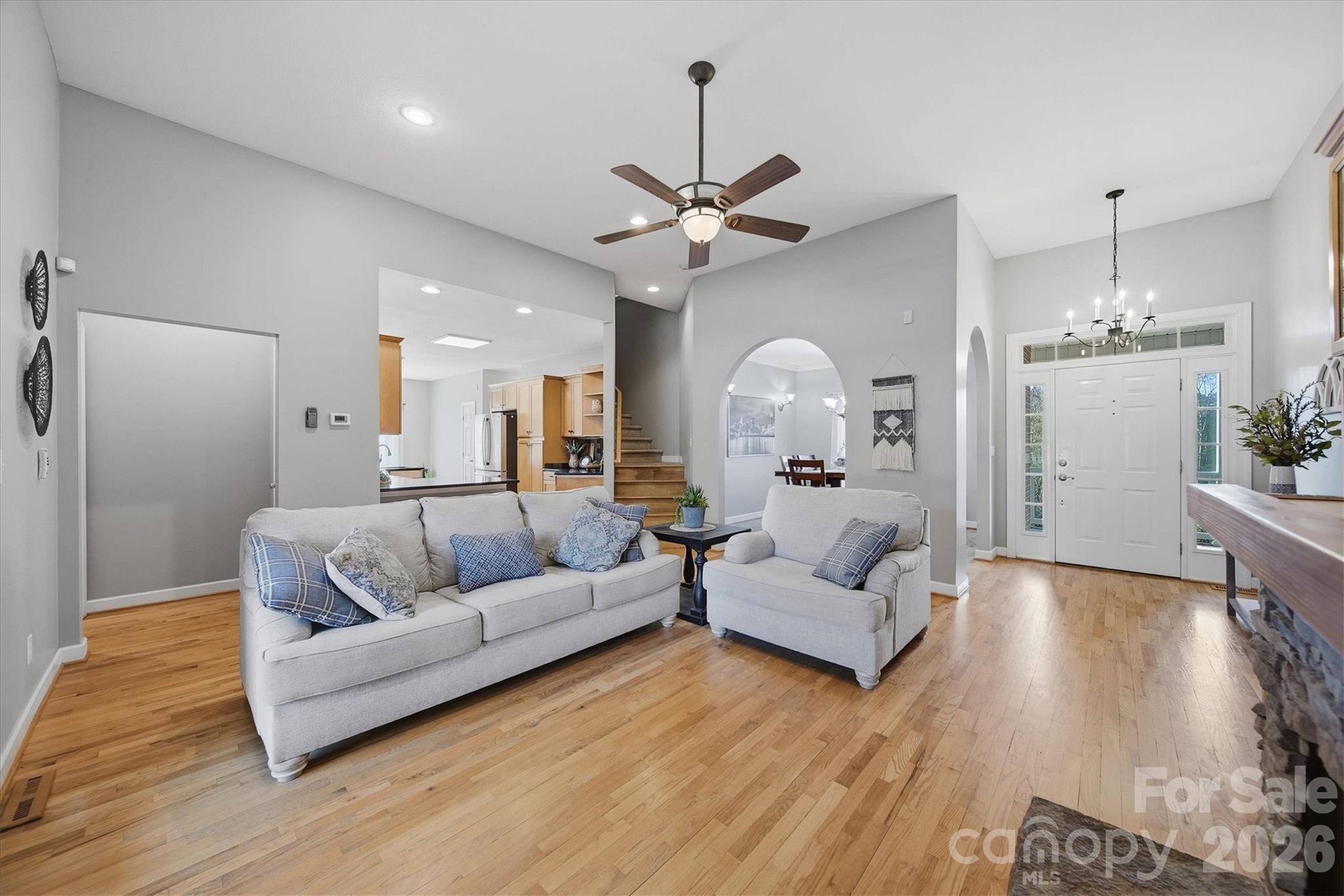 2555 Knox Landing Road Connelly Springs, NC 28612 - Photo 9 of 48 a living room with furniture and a chandelier
