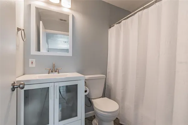 a bathroom with a sink and a toilet