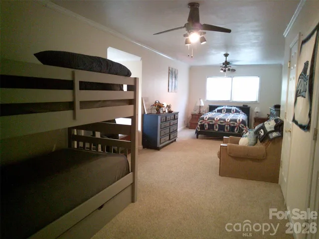 a view of a chairs and table in the patio