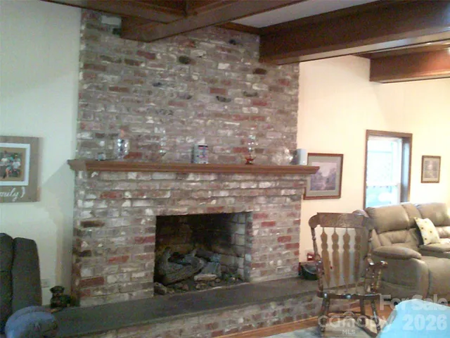 swimming pool view with a outdoor seating space