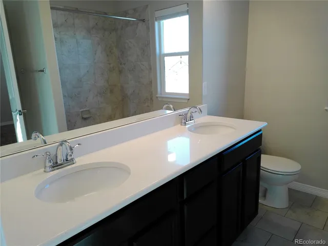 a bathroom with a bath tub and a shower