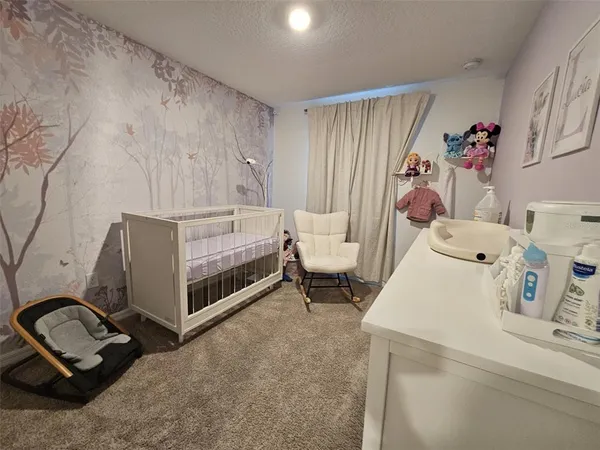 a view of storage and utility room with washer and dryer