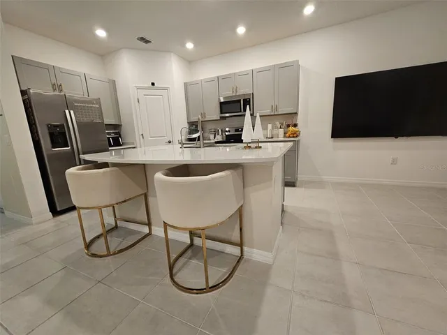 a view of storage and utility room with washer and dryer